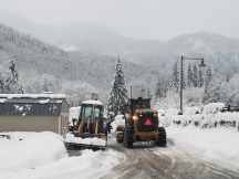 King County Roads crews helped plow a school parking lot in snow-covered Skykomish so crews could deliver a generator to a local K-12 school building.