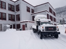 After King County Roads cleared a school parking lot, crews were able to deliver this generator to a school building in snow-covered Skykomish.